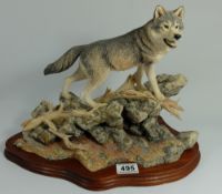 A large Border Fine Arts figure of a Wolf on rock " Pack Leader"  by R T Roberts, height 31cm