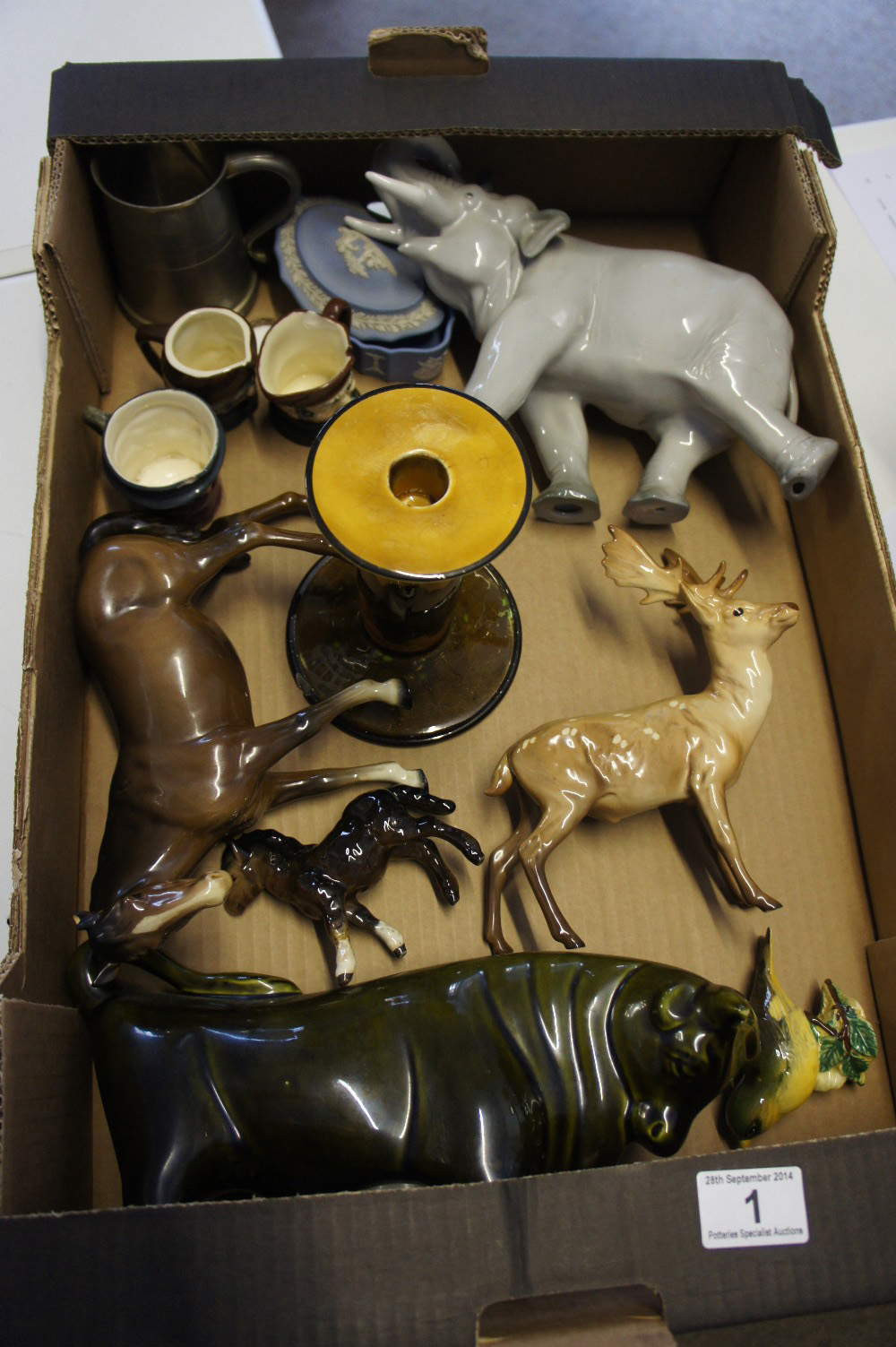 A collection of various Animal figures and character jugs by Royal Doulton , Beswick, Russian