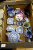 A collection of Wedgwood jasperware to include teapots trinket boxes dishes and a pink luster jug (