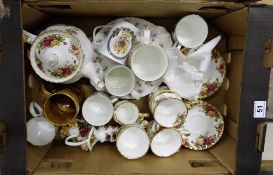 A collection of Royal Albert old country roses, commemorative mugs etc