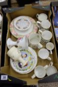 A collection of pottery to include Doulton poetic rose dinner plates, Aynsley and Spode