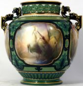 Hadleys Worcester twin handled vase handpainted with panels of Herons by the waterside, height 19cm