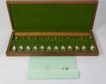A quality set of silver spoons, The Royal Horticultural Society Flower Spoons, 12 hall marked silver