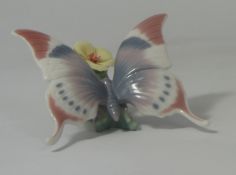 Lladro Butterfly on a flower, boxed