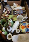 A collection of pottery to include Bird and animal figures, Toby Jugs etc