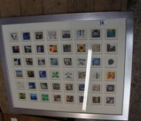 Large framed Royal mail picture showing a large selection of stamps.
