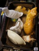 A collection of pottery to include large Staffordshire Jus Cats models, Birds etc
