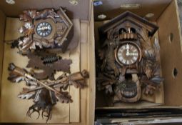 A Swiss forest carved wood Cuckoo clock and smaller one  (2)