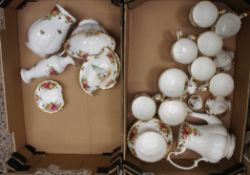 A collection of pottery to include Royal Albert part coffee set consisting of cups, mugs, side