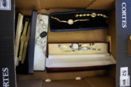 A collection of costume jewelry and watches