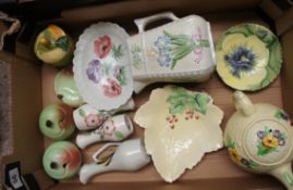 A collection of pottery to include Carltonware apple cruets set, Sylvac teapot and dish, Poole