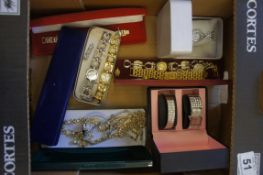 A collection of costume jewelry and watches