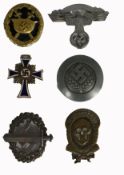 A large collection of German first & second world war badges comprising various enamel and metal (