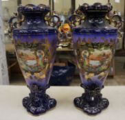 Pair Exeter Ware vase with Japenese decoration, height 51cm  (cracks) (2)