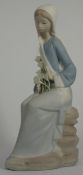 Lladro Figure of a Woman with Lilies (chip to finger)