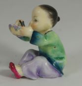 Royal Worcester figure of boy eating Rice "China" height 6cm