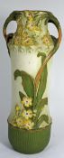 Amphora two handled Art Noveau Vase decorated with embossed flowers, height 39cm