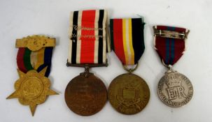 A collection of medals to include Faithful Service in the special Constabulary awarder to William