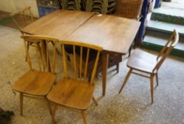 Ercol extending dinning table with pop up leaf,  4 matching dinning chairs and oak coffee table  (