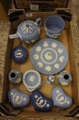 A collection of Wedgwood blue jasperware to include Teapot, Planter, Trinket boxes & covers, dishes,