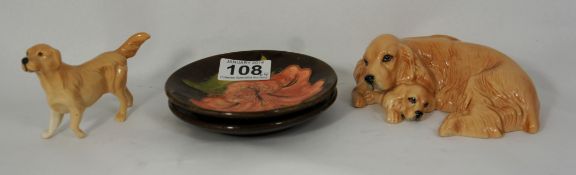 2 Moorcroft pin dishes together with Royal Doulton labrador and Puppies and Beswick Labrador(4)