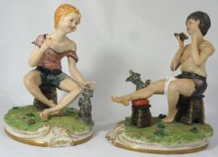A Pair Signed capodimonte Figures children playing with animals (2)