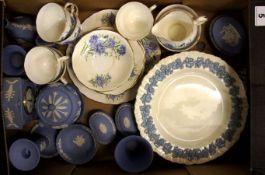 A collection of Wedgwood Blue Jasperware dishes, Trinket boxes, Clock , Queensware plates and