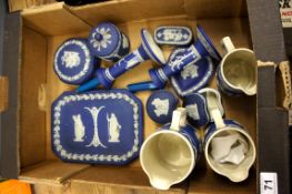 A collection of early dark blue jasperware to include trinket set, 3 spode jugs (slight damages)
