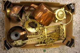 A good collection of copper and brass wares to include fireside set, brass cannon, copper kettles