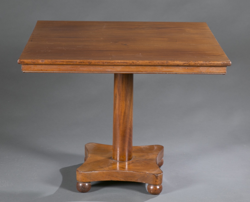 A hardwood tilt-top table. 19th century. With pedestal base and ball feet. (NEEDS MEASUREMENTS) - Image 2 of 4