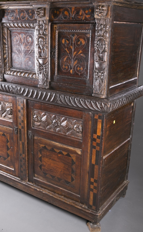 A Continental carved and inlaid cupboard. Late 17th / early 18th century. Having 2 top blind, - Image 4 of 6