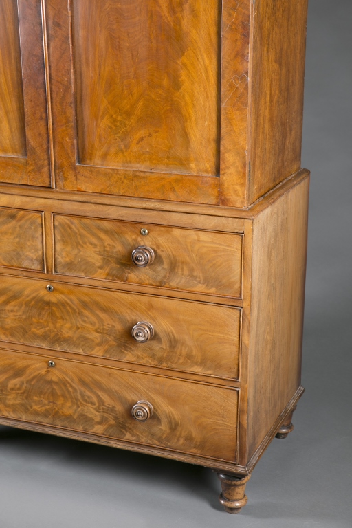 A linen press with book matched mahogany veneer. 19th c.  Incorporating a ogee arch on top panel - Image 2 of 5
