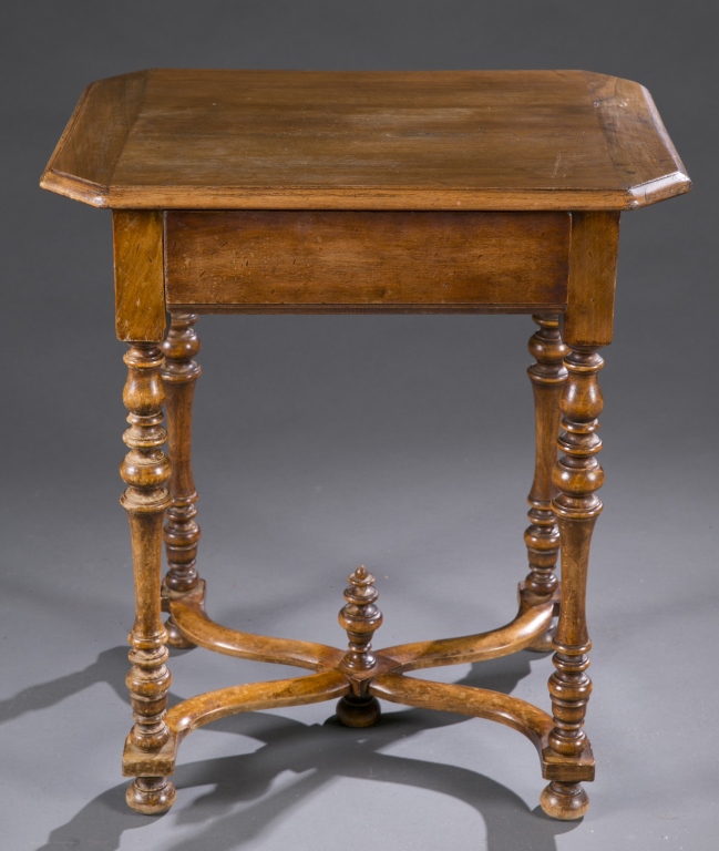 A William and Mary style walnut table with drawer. 18th century.  Having turned legs, cross