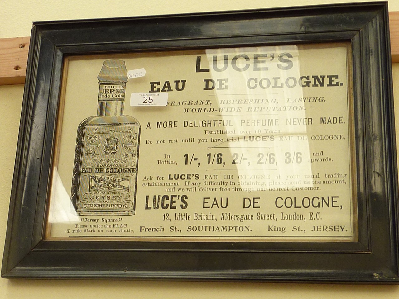 A Luce`s Eau De Cologne advertising sign in ebonised frame
