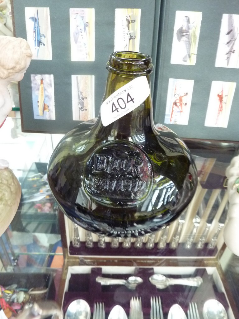An unusual glass onion bottle
