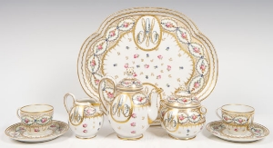 Early 20th century French porcelain cabaret set, each piece painted with floral sprigs, some