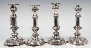 Set of four Regency period Sheffield Plate telescopic candlesticks of columnar form, with scroll and