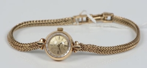 Ladies' 1960s Omega gold (9ct) wristwatch on gold mesh bracelet, in original box   CONDITION REPORT