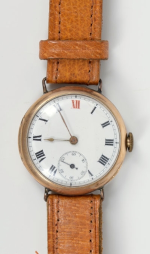 1920s gentlemen's gold (9ct) wristwatch with circular enamel dial, Roman numerals and subsidiary