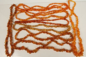 Eight amber / amber-type necklaces with free form beads