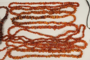 Ten amber / amber-type necklaces with free form beads