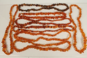 Eight amber / amber-type necklaces with free form beads