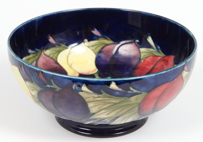 Fruit & Berries, Moorcroft bowl, blue ground, painted and impressed marks, 8.5cm high, 18cm diameter