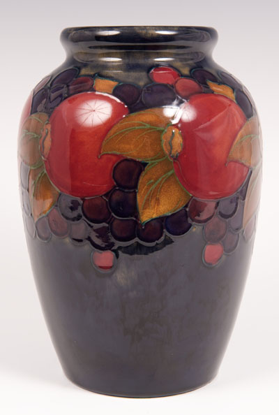 Pomegranate large William Moorcroft vase, 1913 - 25, blue ground, impressed and painted marks, 23.
