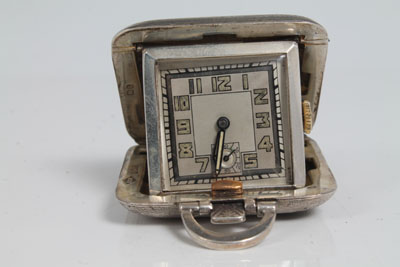 Art Deco silver pocket / travelling watch in square engine-turned case, silvered dial, fifteen jewel