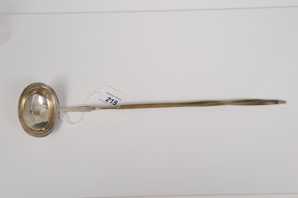 William IV silver toddy ladle of oval form, with flared reeded rim and stem and twisted whalebone