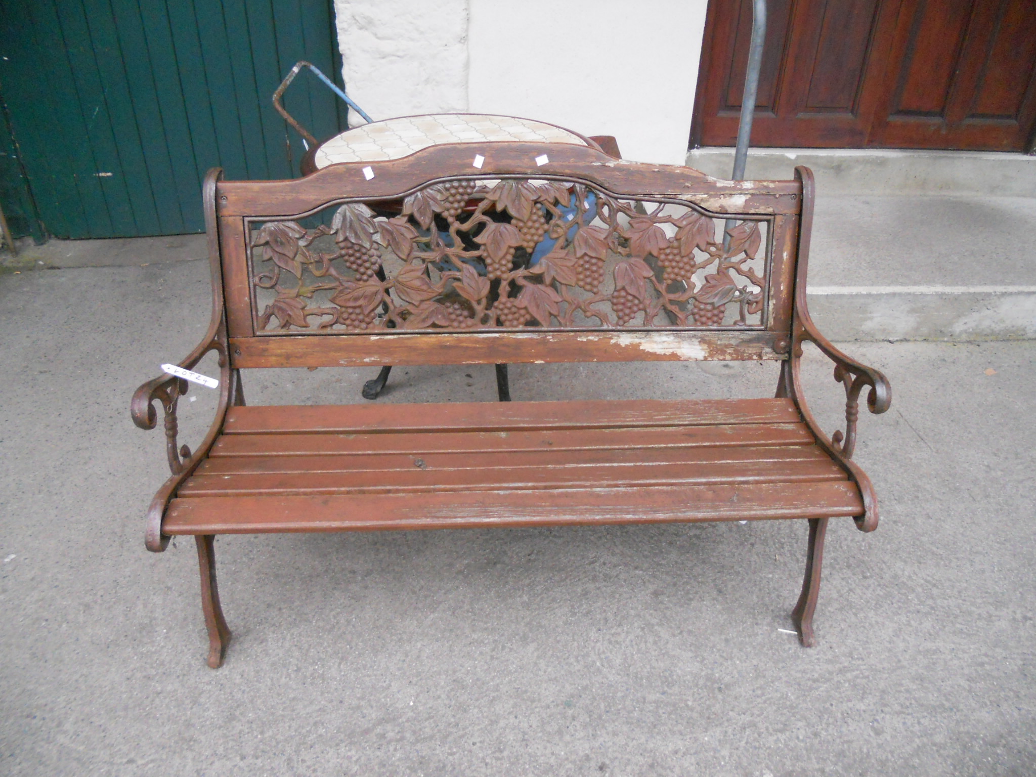 A Cast Iron Framed Garden Bench With, Outdoor Bench With Back Panel