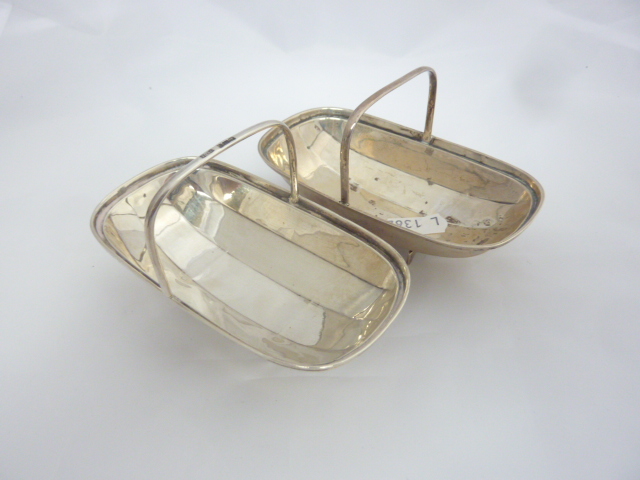 A PAIR OF DIXONS MINIATURE SILVER TRUGS, Sheffield 1909 and 1938 (approximately 82g) (2)