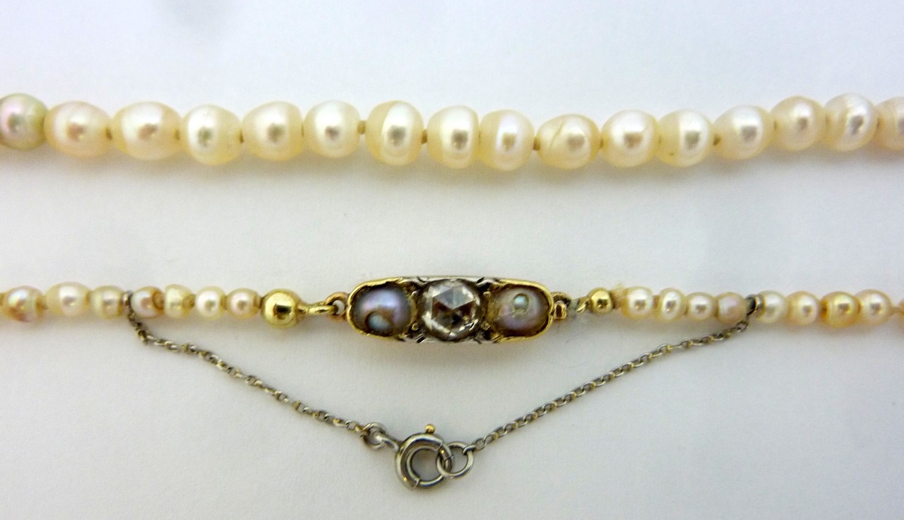 A NATURAL PEARL NECKLACE, designed as a strand of ninty-two pearls with pearl and diamond clasp, - Image 3 of 3