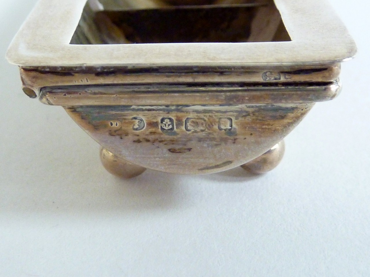 A SILVER TRIPLE STAMP DISPENSER, spring loaded hinged cover, (lacking glazing), gilt interior, - Image 2 of 2